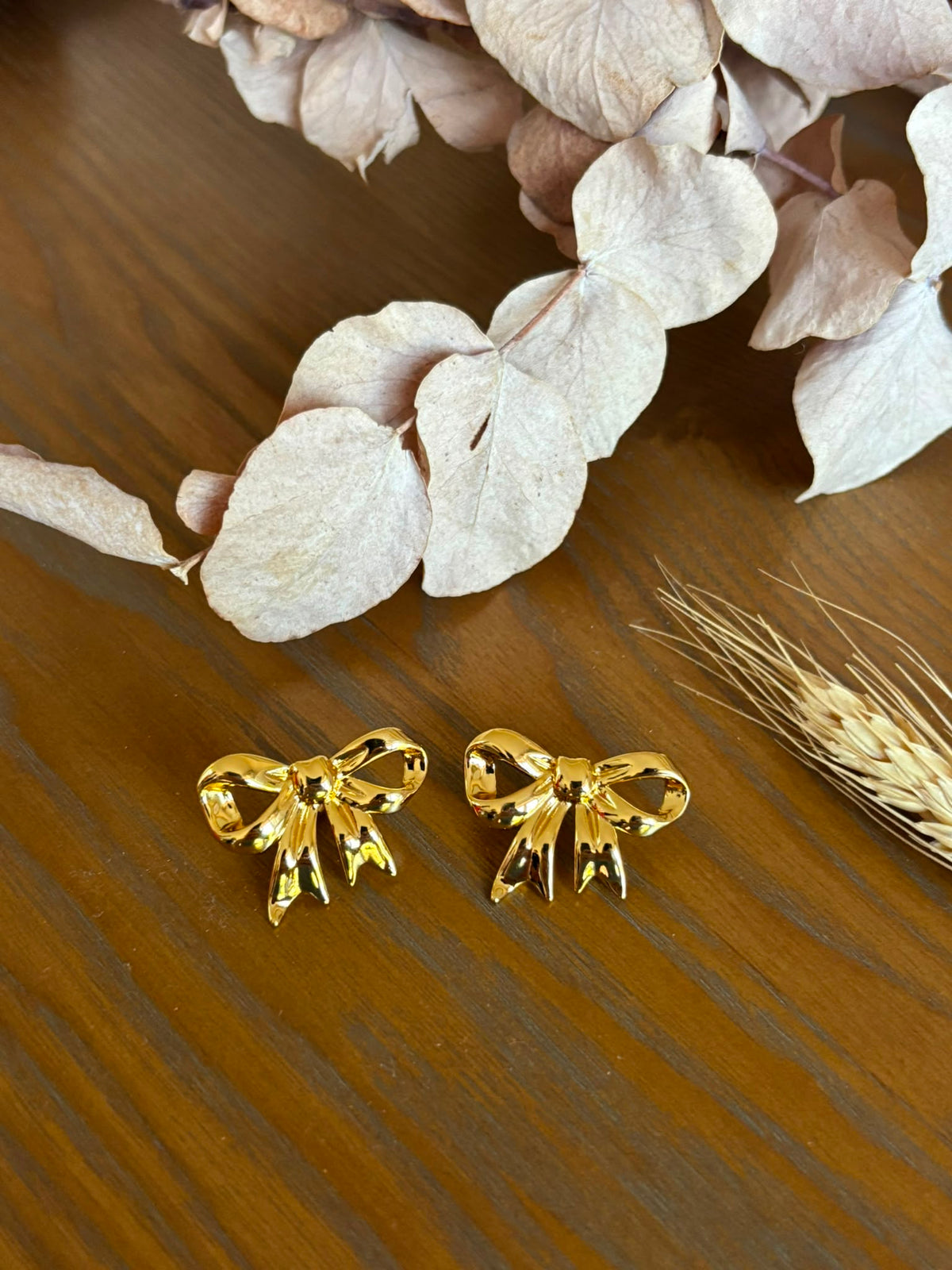 Boucles d’oreilles nœud doré